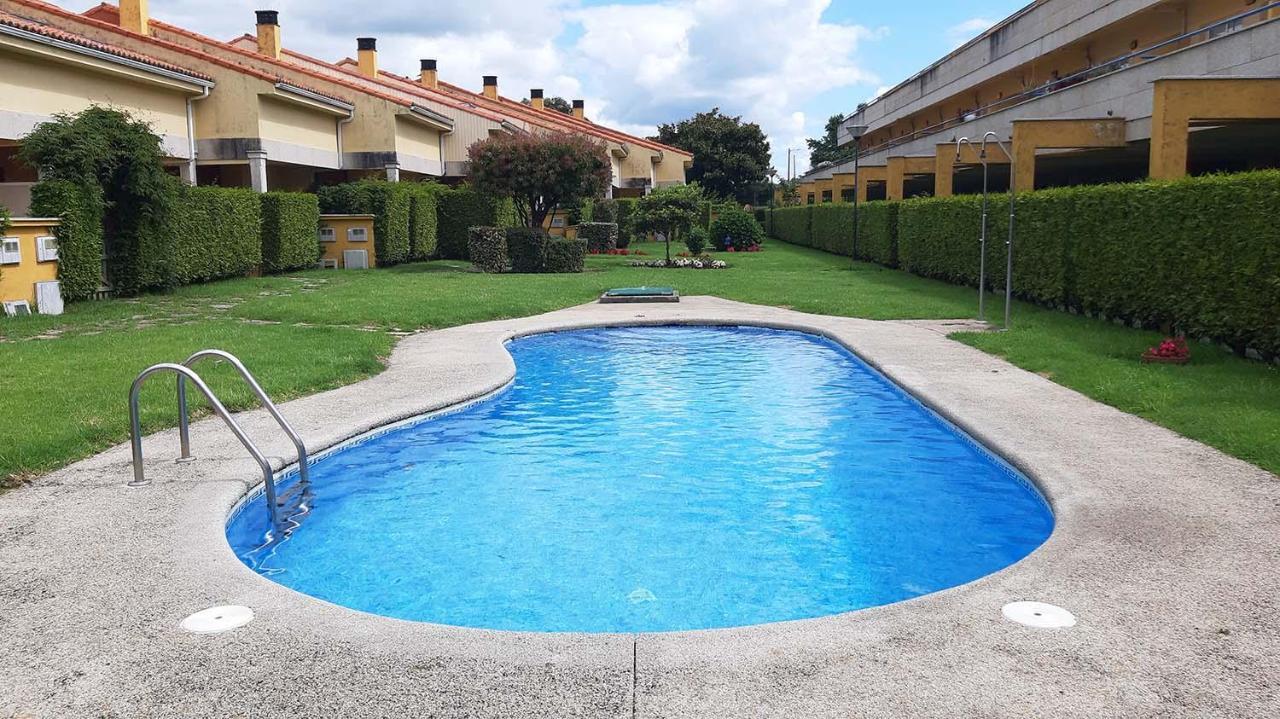 Apartamento Con Piscina En 波尔托辛 外观 照片